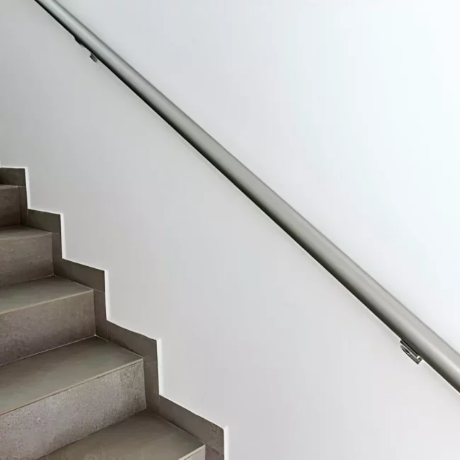 Wall mounted stair handrail