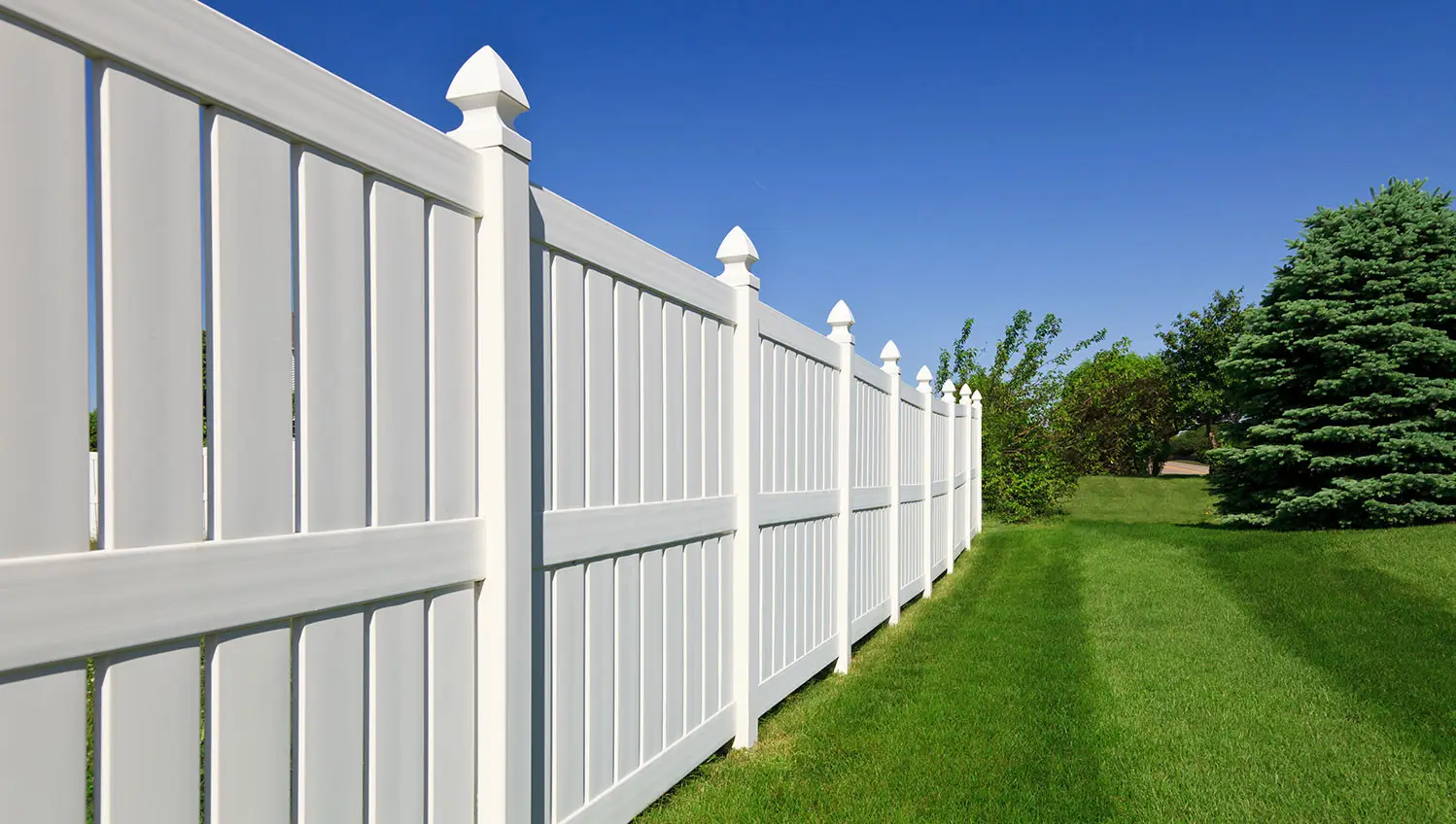 white aluminum fence