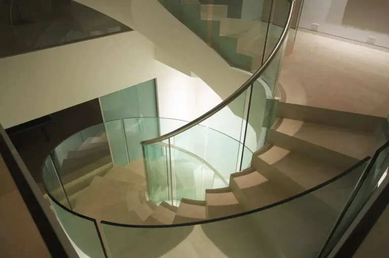 Curved Glass Railing in West Palm Beach, FL | Luxury Staircase Railings