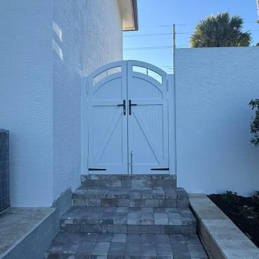 white aluminum fence